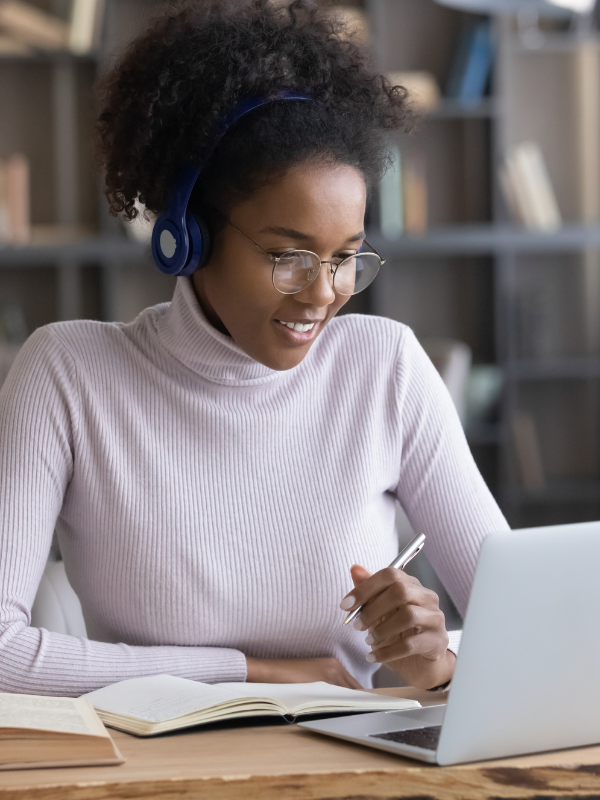 Woman looking at laptop